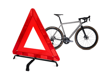 Red warning triangle and a road bike.